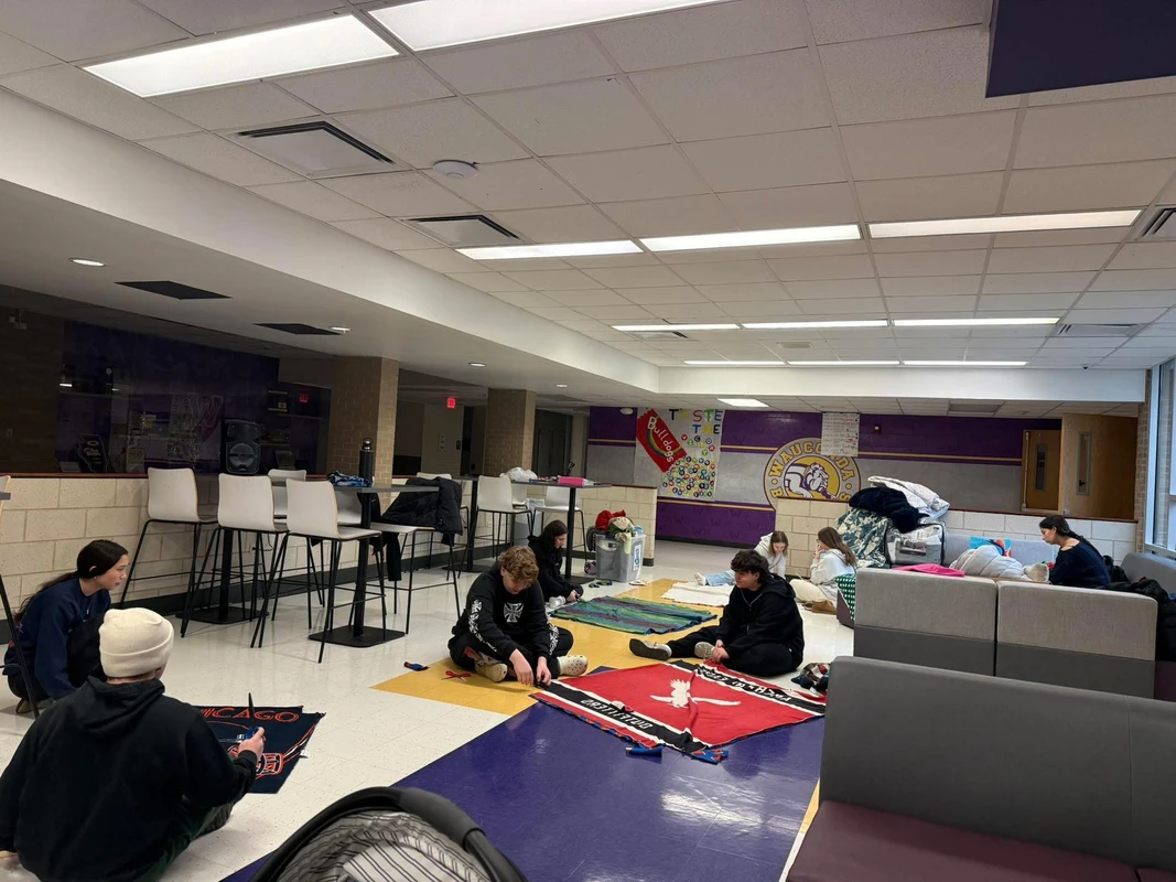 Students creating blankets with donated fabric for the Verdance for Veterans initiative