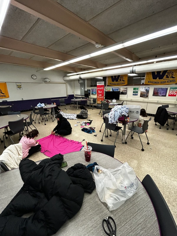 Students creating blankets with donated fabric for the Verdance for Veterans initiative