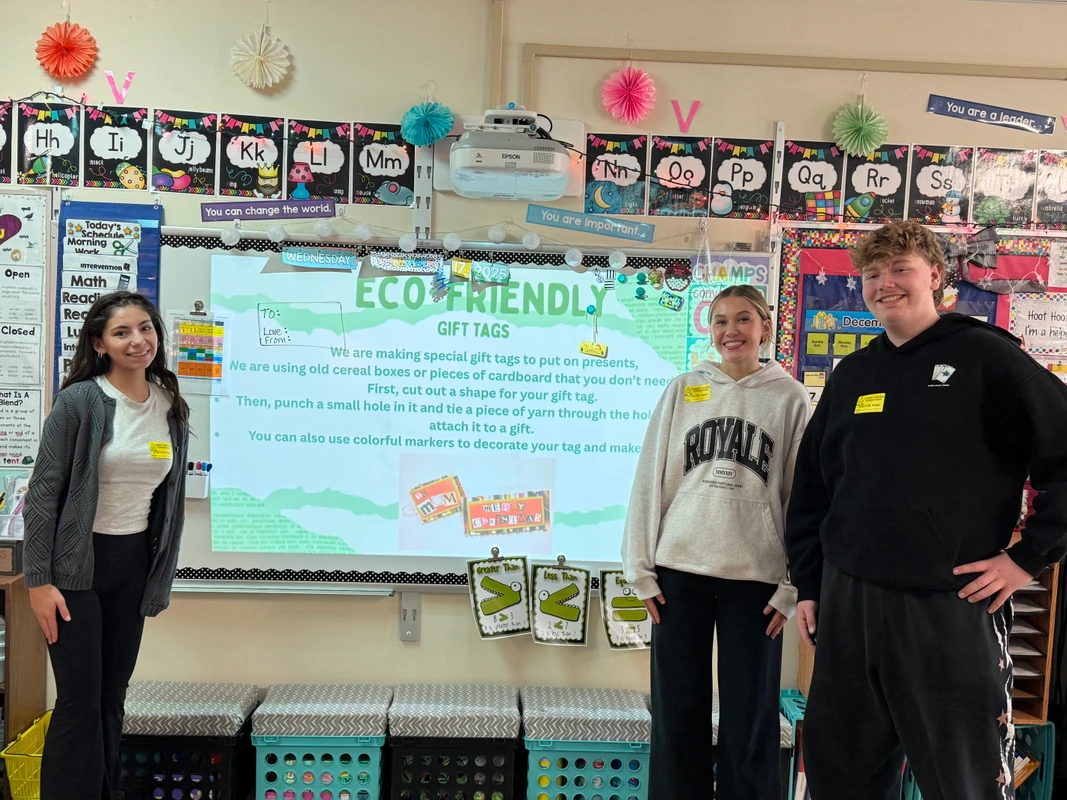 Student volunteers presenting to Robert Crown students